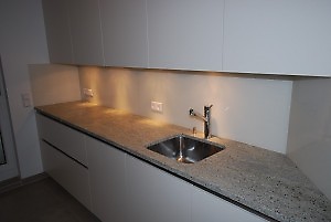 white kitchen with large work surface