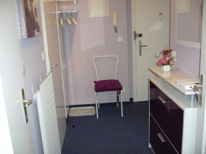 small entrance hall with cloakroom and a small closet