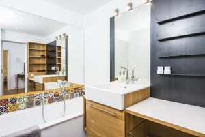 bathroom with tub and shower