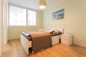 modern bedroom with double bed in accommodation Vienna