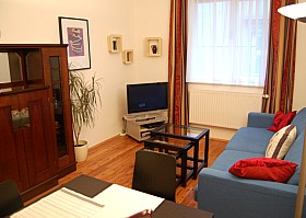 TV and a beautiful rustic cupboard