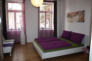 the bedroom with translucent curtains